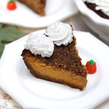 Plated slice of pie on white plate.