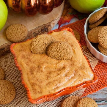 Pumpkin Pie Dip with cream cheese in bowl with gingersnaps.