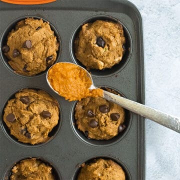 Pumpkin Zucchini Muffins in muffin tin.