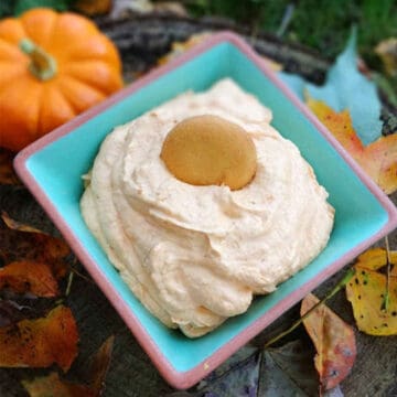 Whipped Pumpkin Dip in bowl with Nilla wafer.