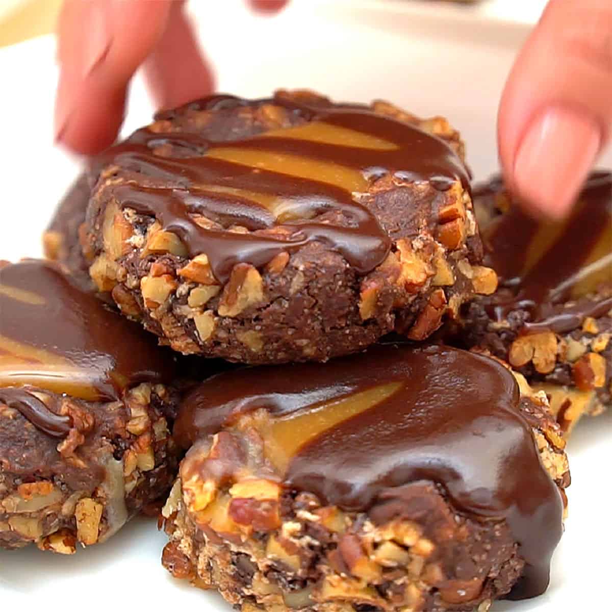 Reaching for Turtle Thumbprint Cookie.