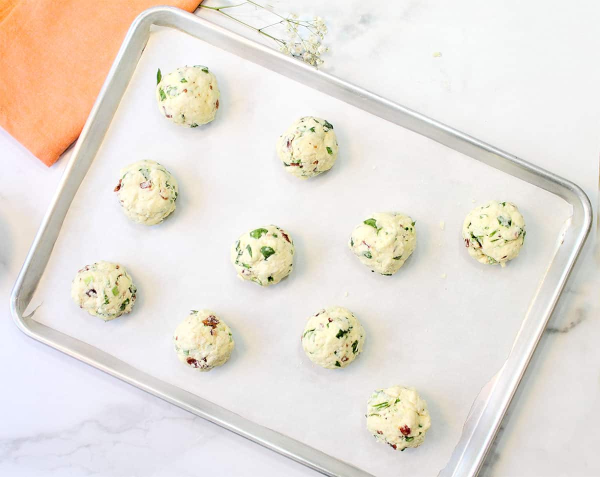 Raw dough on cookie sheet, ready to bake.