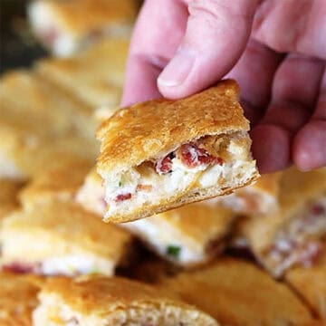 Holding Bacon Crescent Bites.