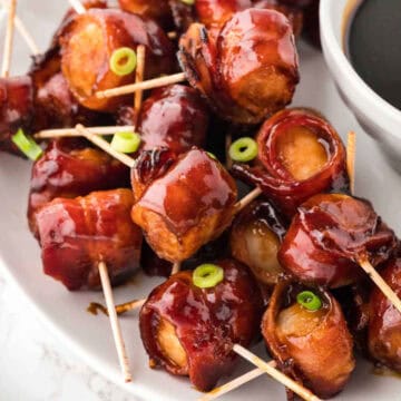 Bacon Wrapped Water Chestnuts with dipping sauce.