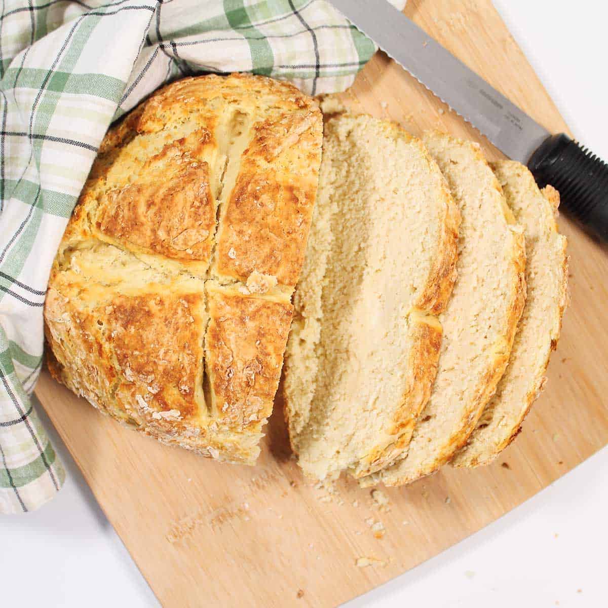 Overhead of sliced loaf of soda bread.