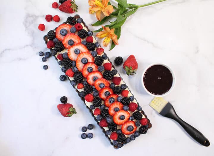 Fruit placed on top of filling ready for glaze.