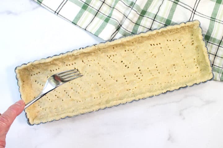 Prick crust all over with fork.