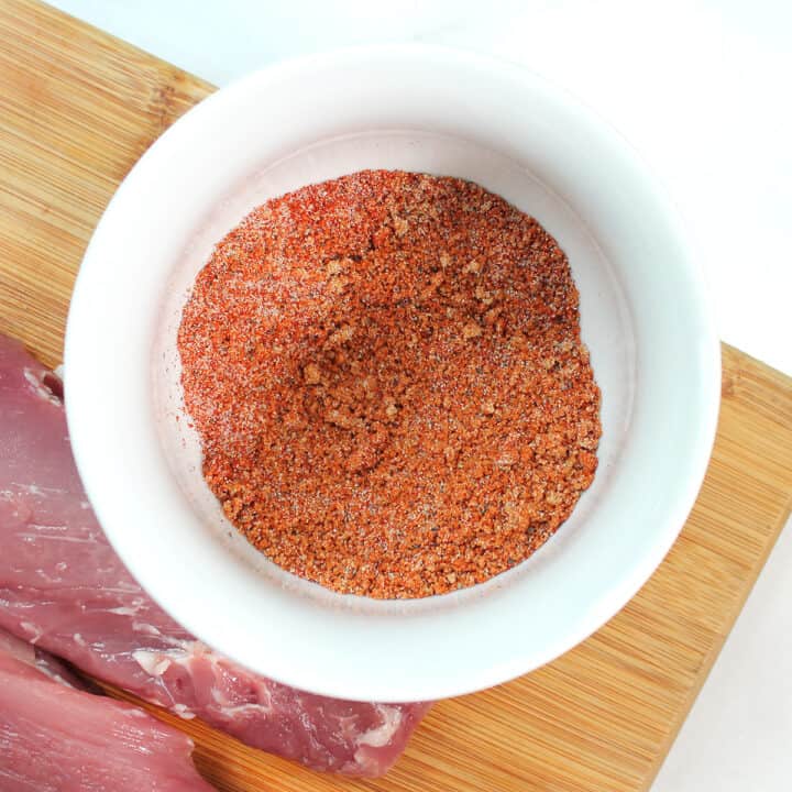 Mixing the spice rub together.