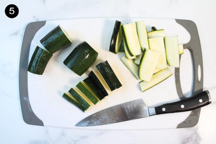 Cutting zucchini into fries.