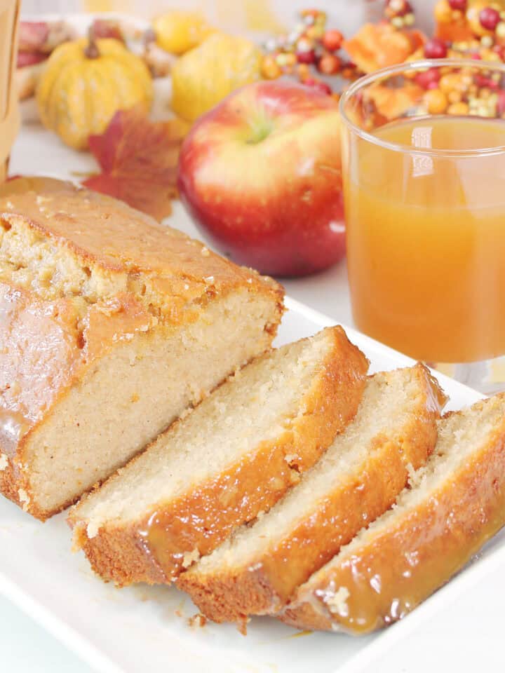 Apple Cider Donut Pound Cake sliced on platter.