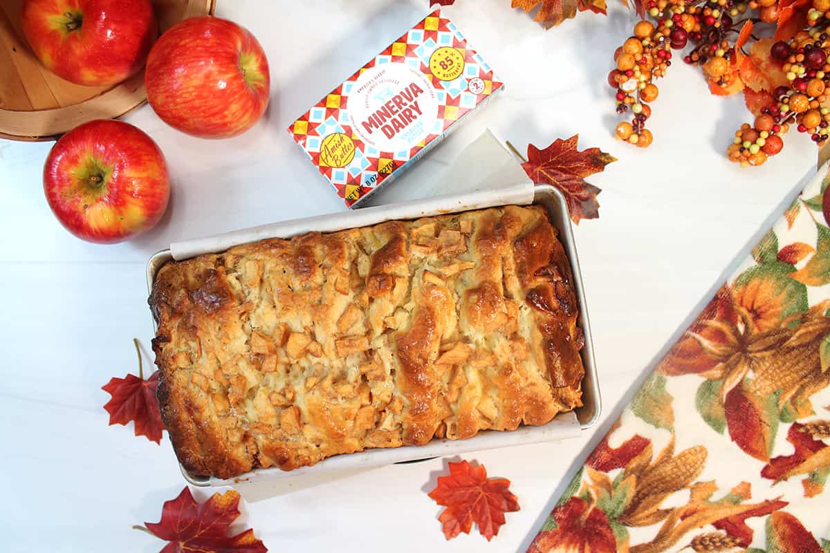 Overhead of baked brioche in loaf pan.