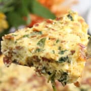 Closeup of slice of frittata on server .