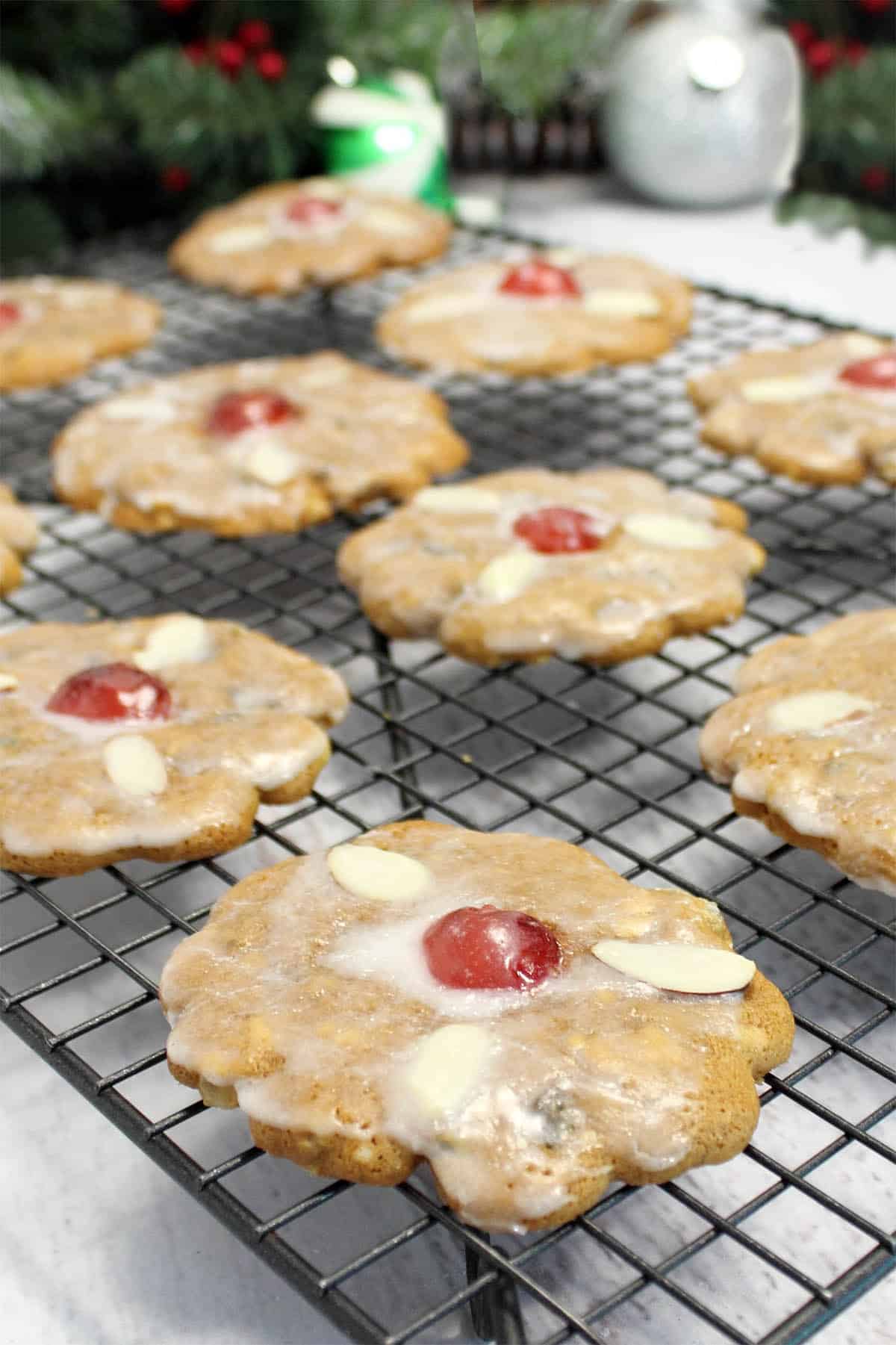 Letting icing set on cookies before storing.