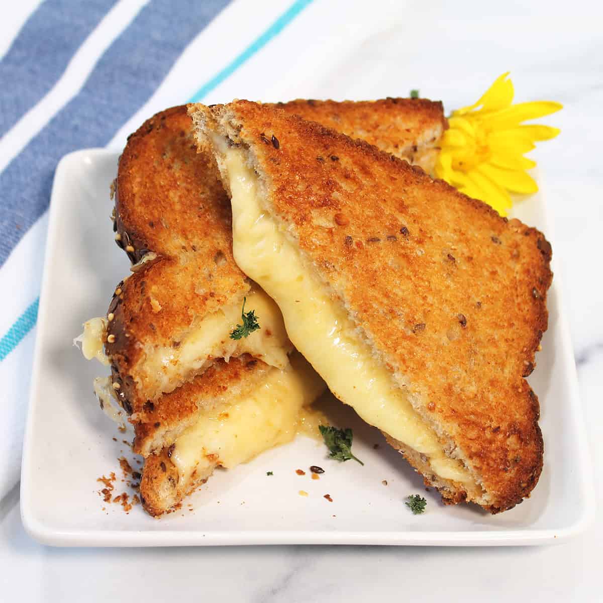 Finished air fried grilled cheese on plate.