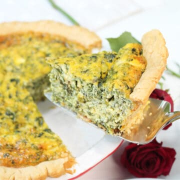 Lifting slice out of pie dish.