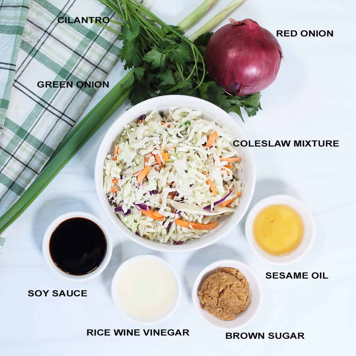 Crispy coleslaw ingredients in bowls.