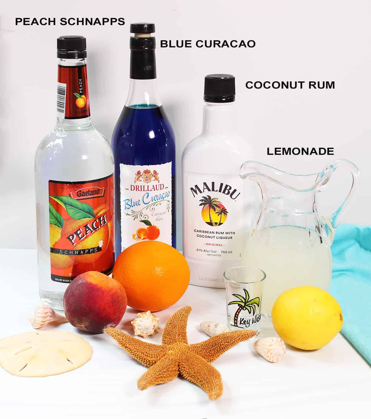 Ingredients for Tipsy Mermaid Drink with starfish.