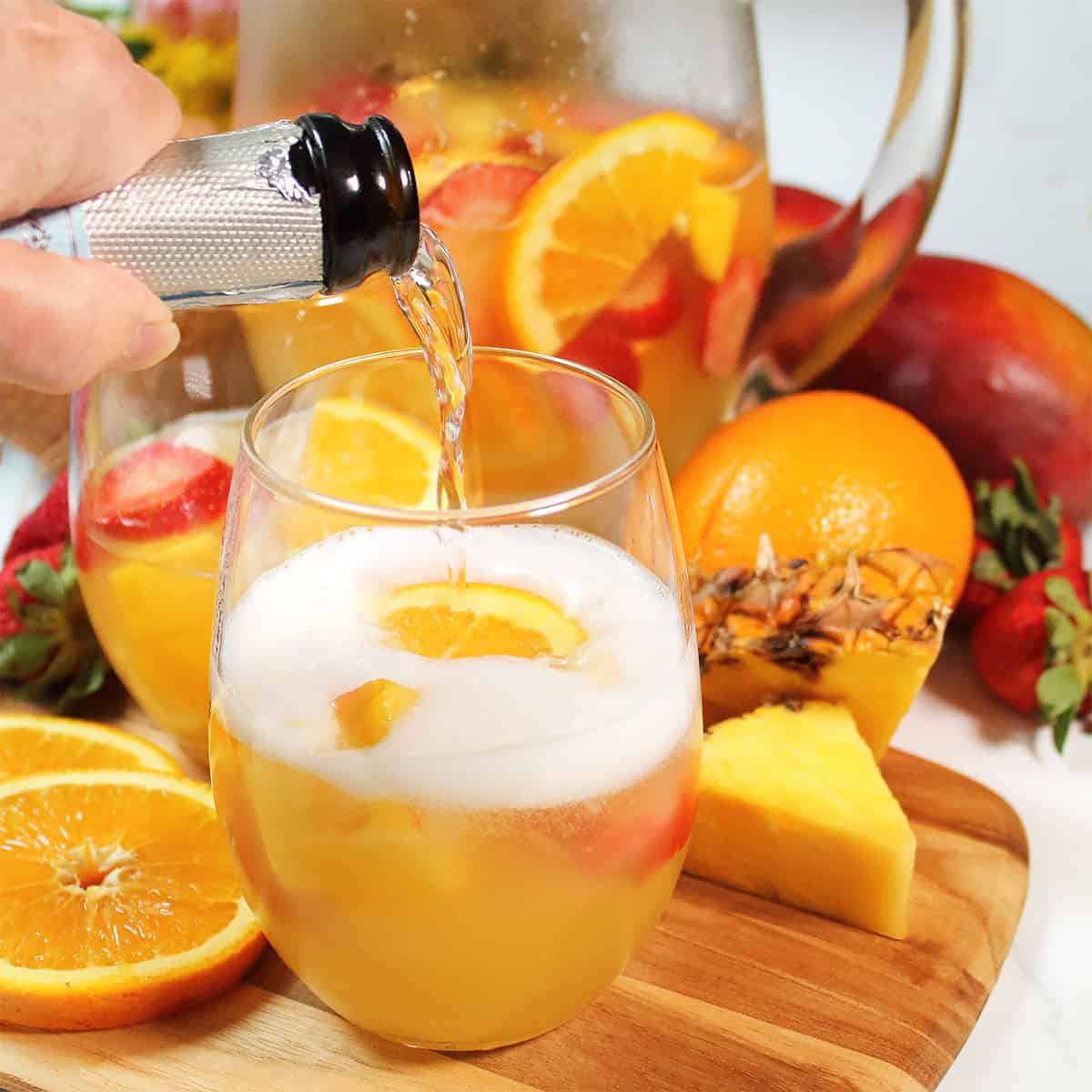 Pouring prosecco into glass.