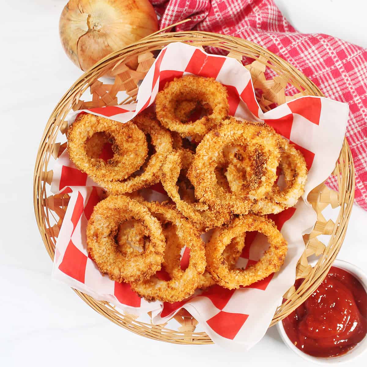 Basket of crispy air fryer onions.