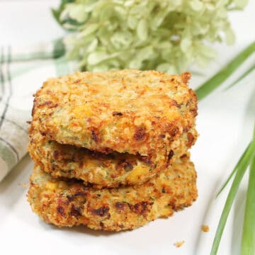 Closeup of three stacked fritters.