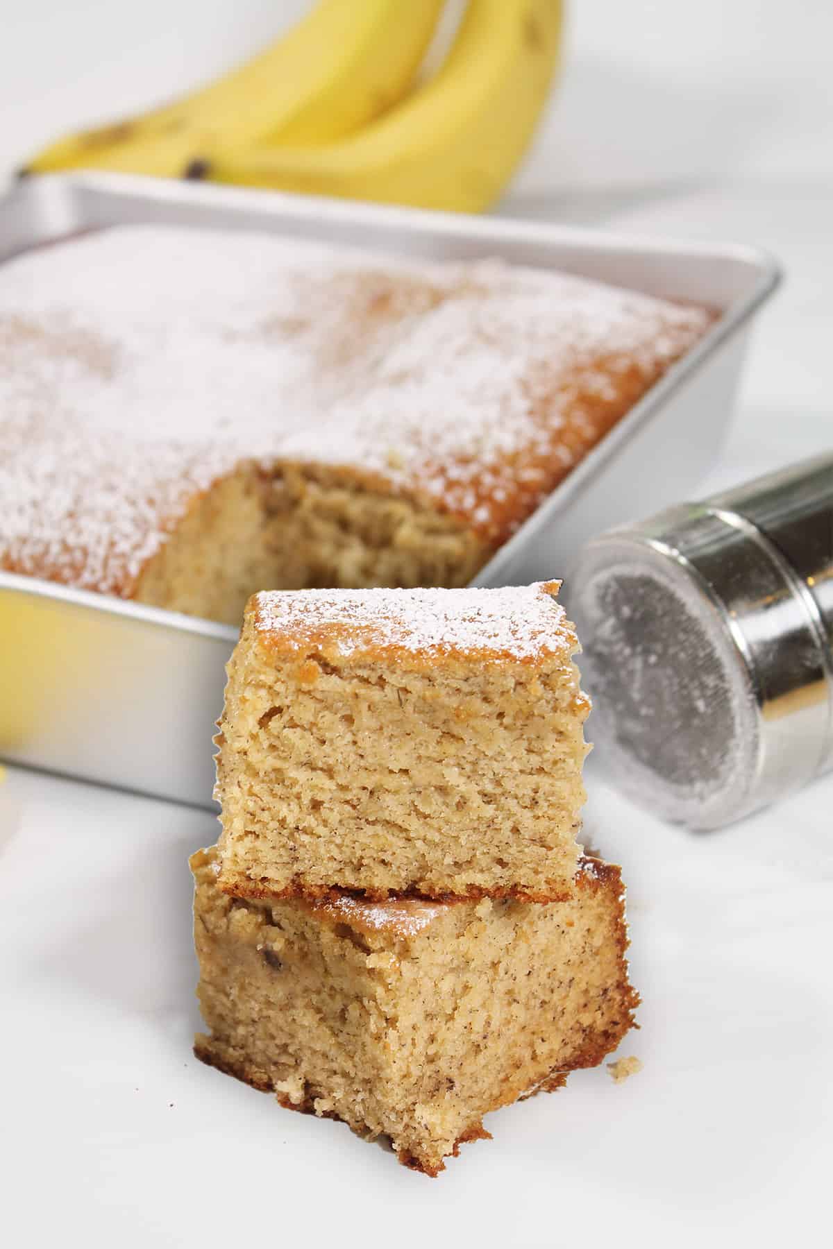 Two slices in front of baking pan.