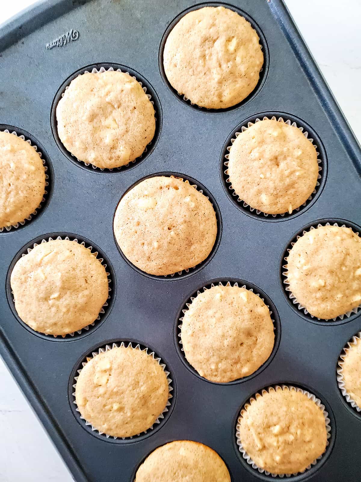 Baked cupcakes in cupcake pan.