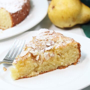 Closeup of slice of cake on plate with fork.