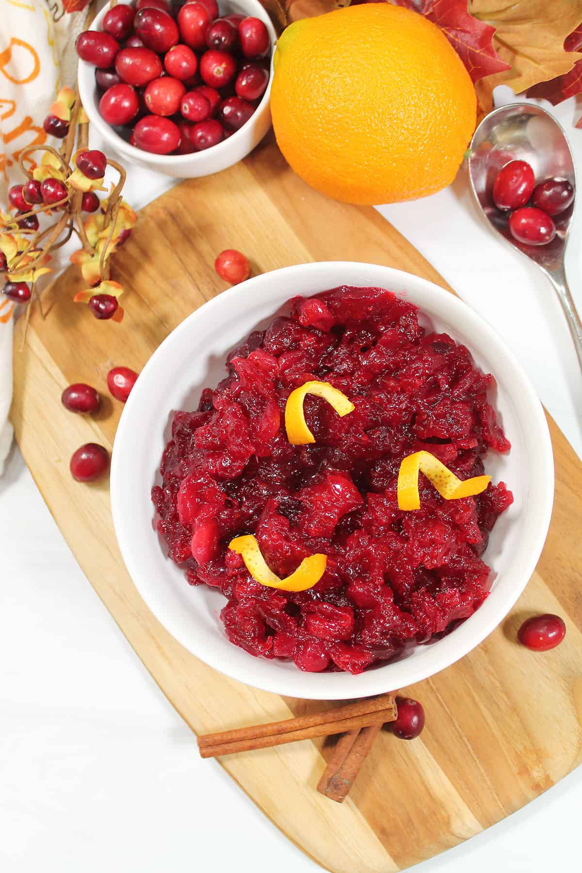 Overhead of Grand Marnier cranberry sauce with orange peel garnish.