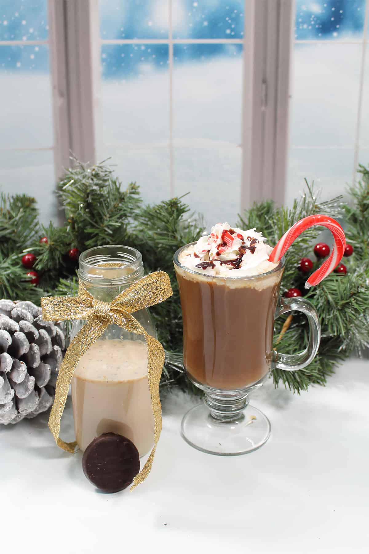 Peppermint mocha creamer in milk bottle next to coffee.