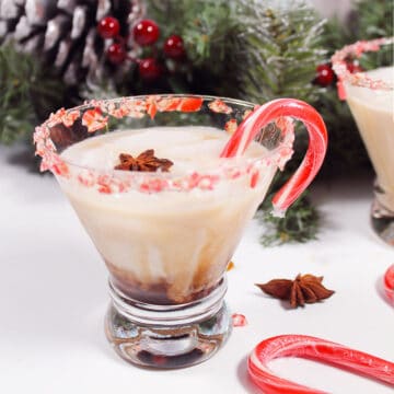Single cocktail with candy cane rim.