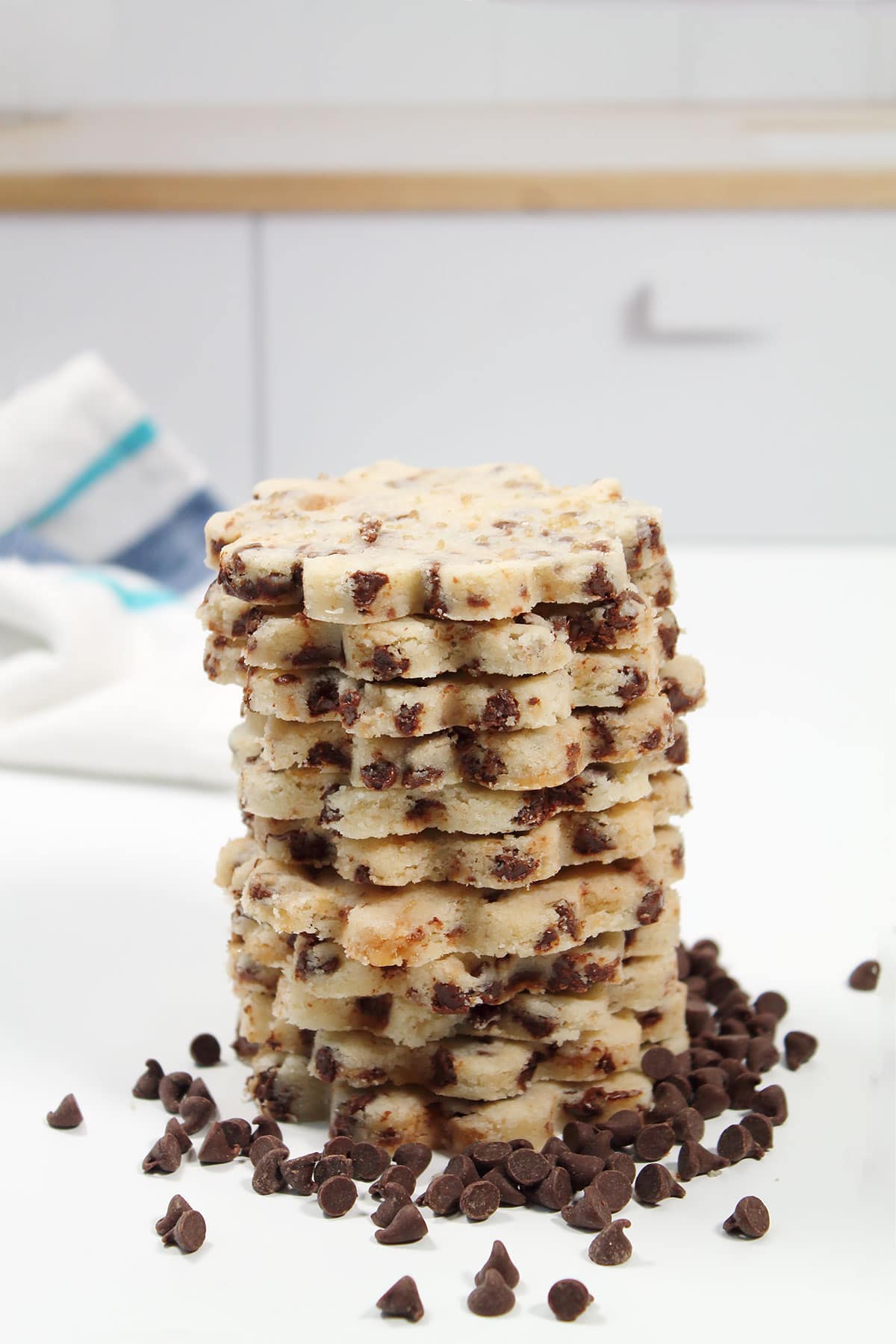 Tall stack of toffee chocolate chip shortbread cookies.