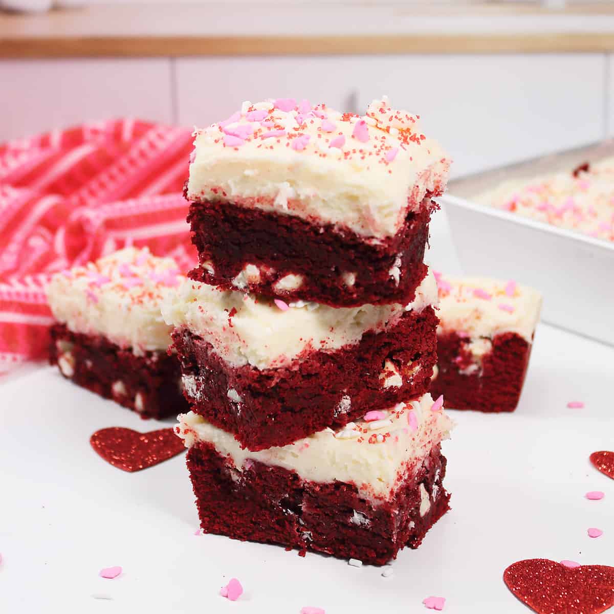 Stack of three brownies.