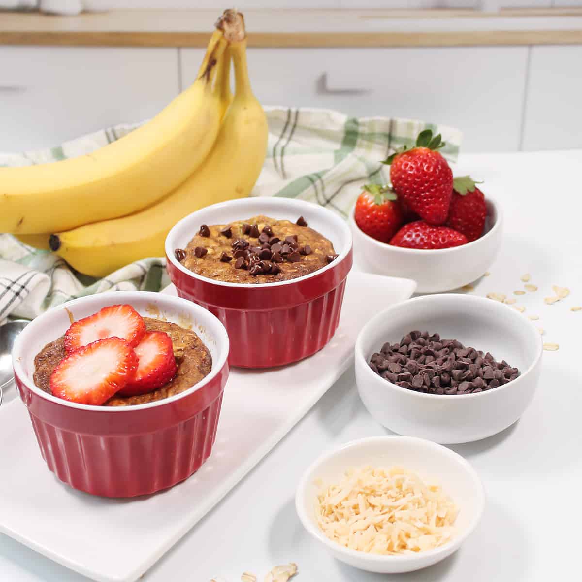 Two air fryer baked oatmeal with toppings.