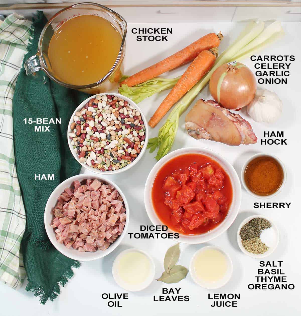 Ingredients for bean soup with ham on table.