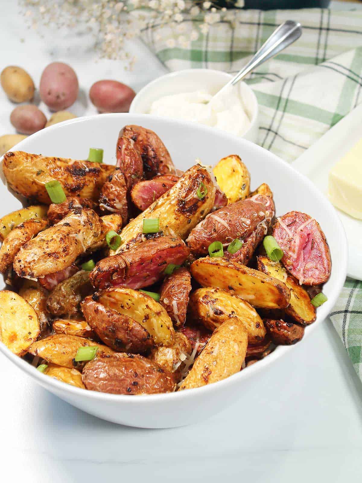 Serving bowl full of air fryer fingerling potatoes.