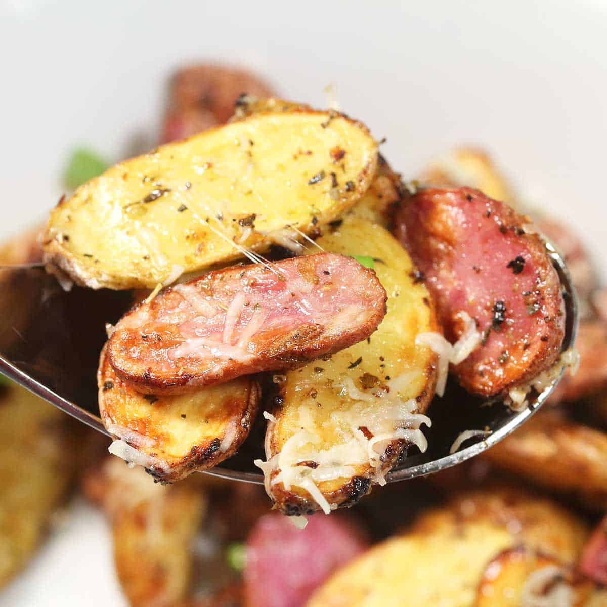 Spoonful of air fryer roasted potatoes.