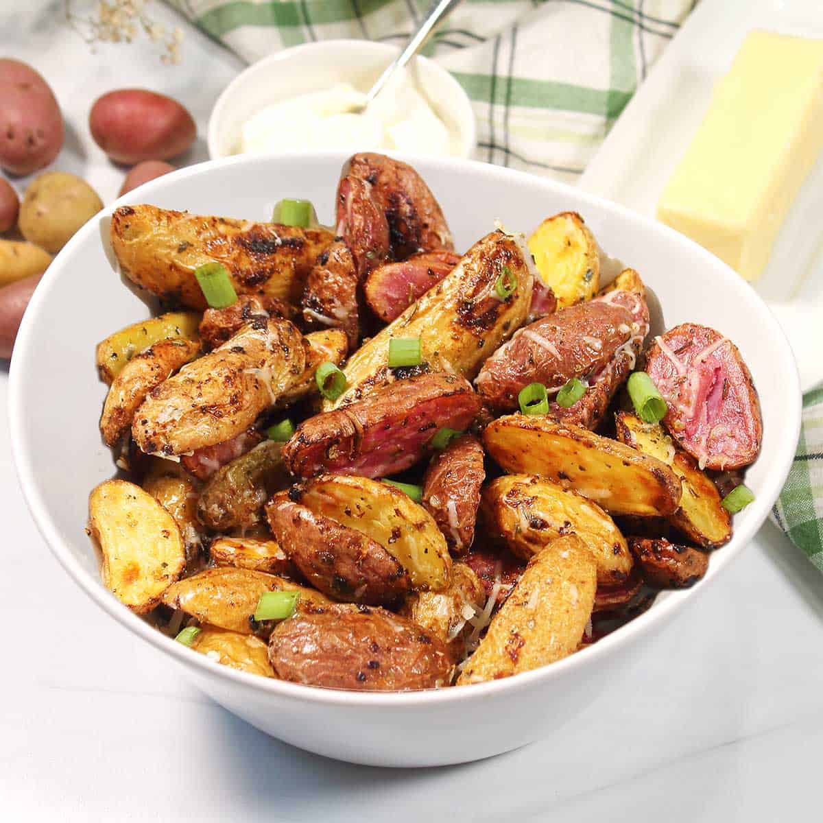 Finished air fryer roasted potatoes in bowl.
