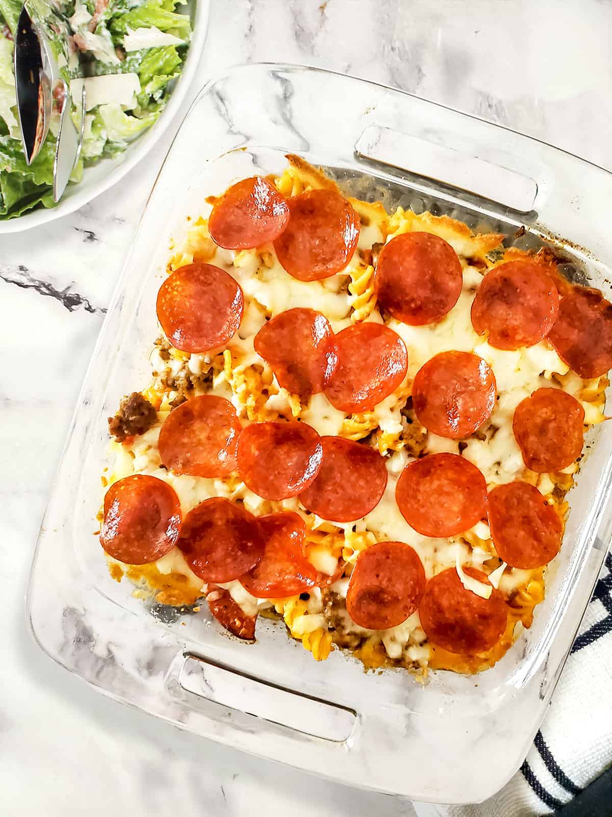 Overhead of baked pizza pasta casserole.