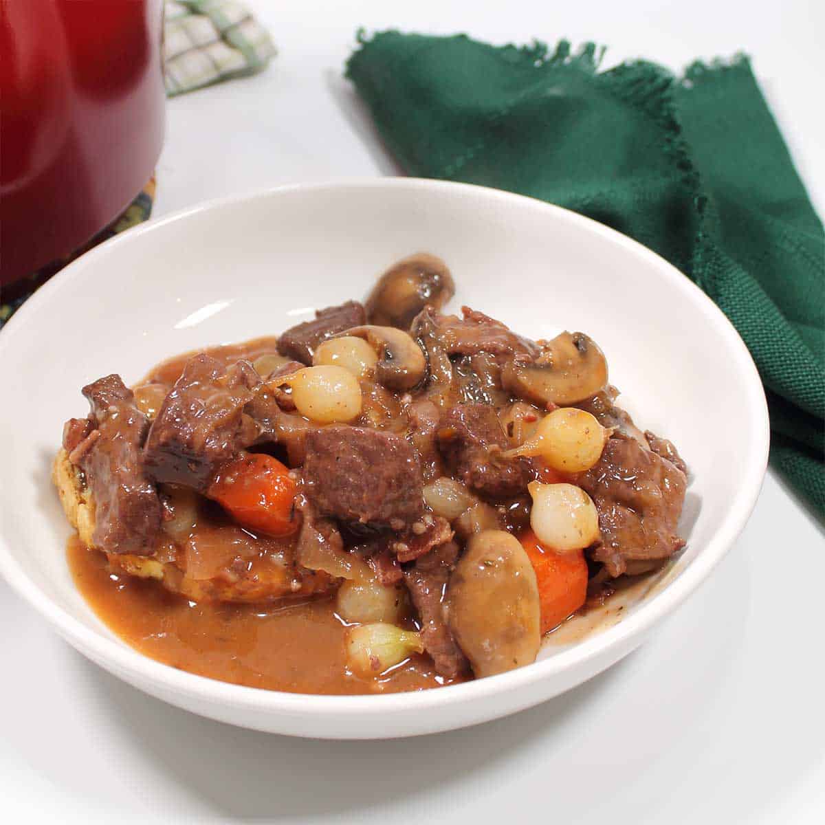 Beef mushroom stew in serving bowl.