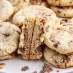 Showing inside of a baked cookie between other cookies.