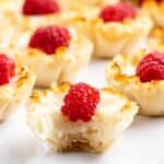 Bite out of lemon tart.