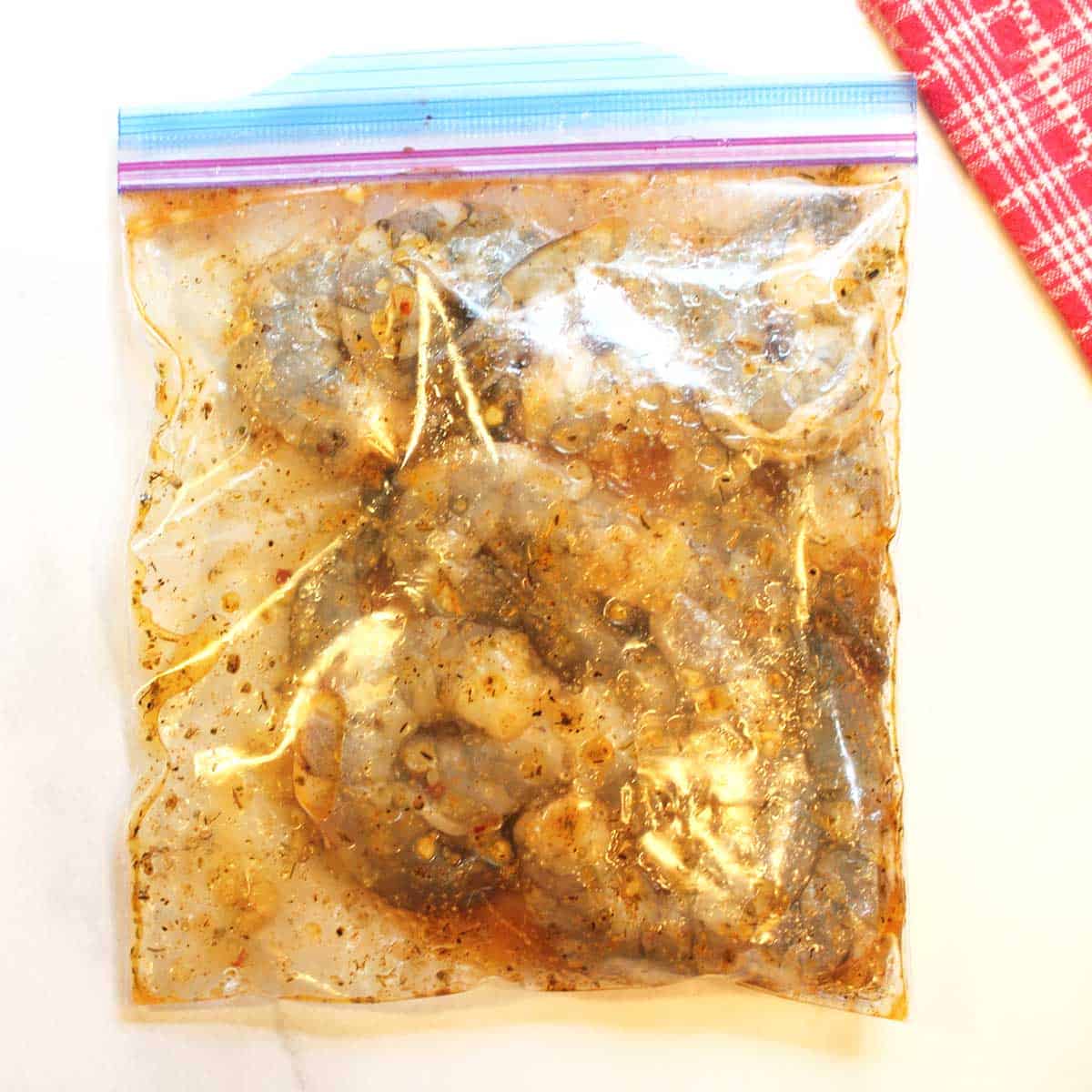 Raw shrimp in marinade.