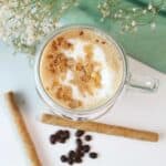 Overhead of latte with cookie crumble topping.