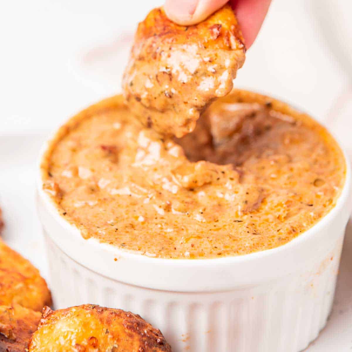 Closeup of creamy marinara in bowl.