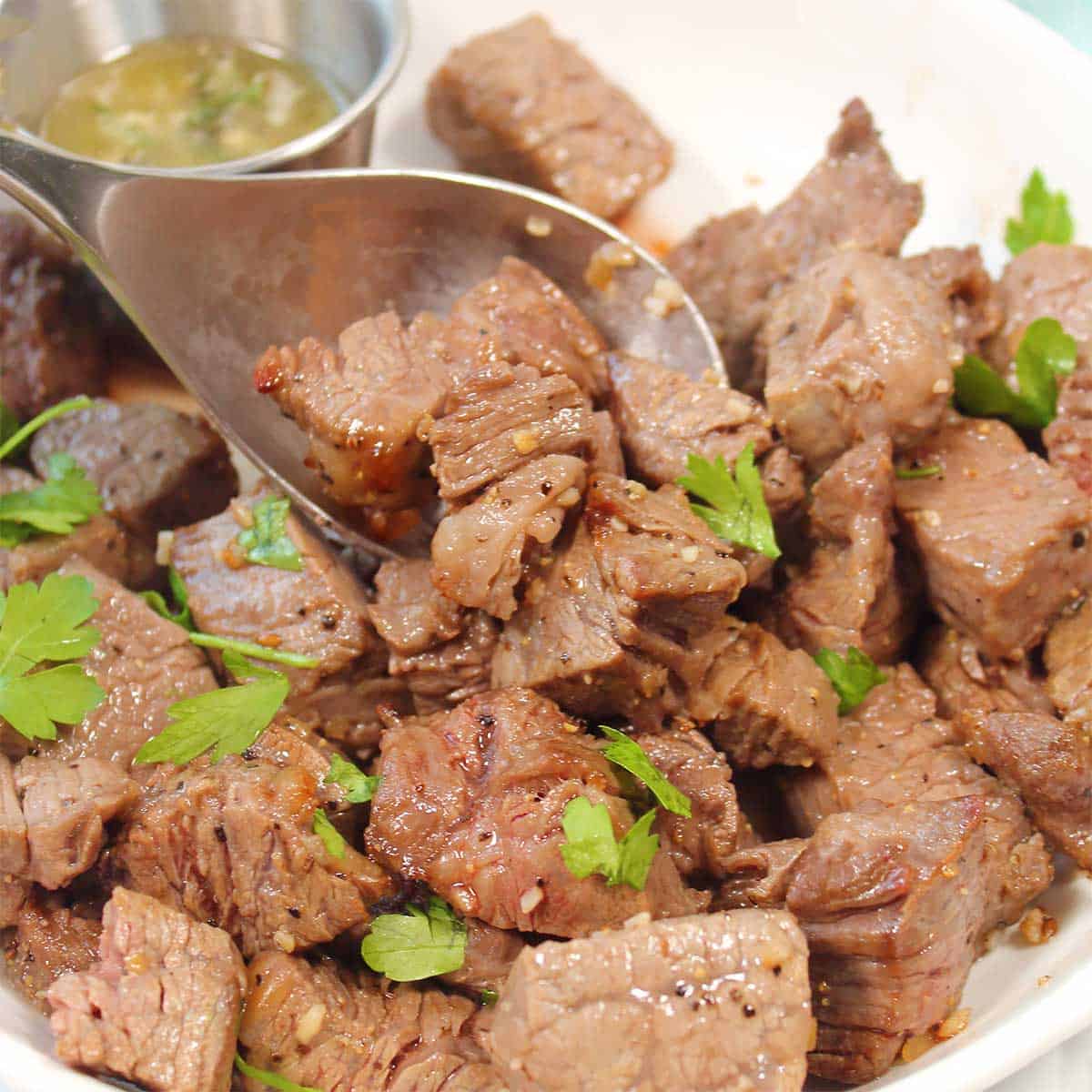 Air Fryer Steak Tips on spoon.