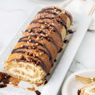 Overhead of finished banana sponge cake roll.