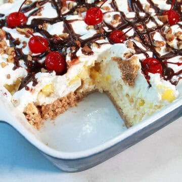 Banana Split No Bake Dessert with slice out.
