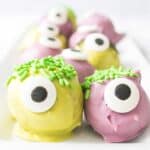 Closeup of decorated Halloween Oreo truffles.