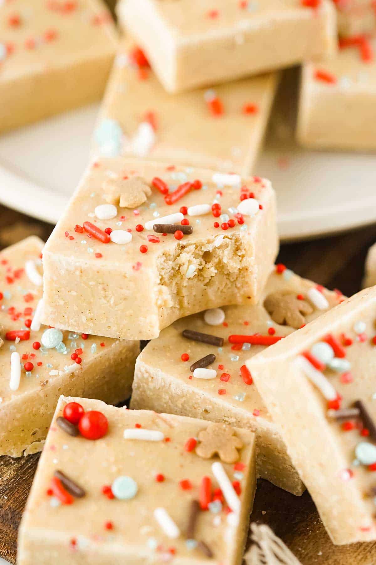 Gingerbread fudge piled high with bite out of top one.