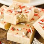 Gingerbread fudge stacked with bite out of top one.